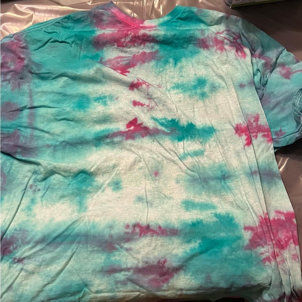 These two tie-dye are both Goldman brand both shirts are unisex